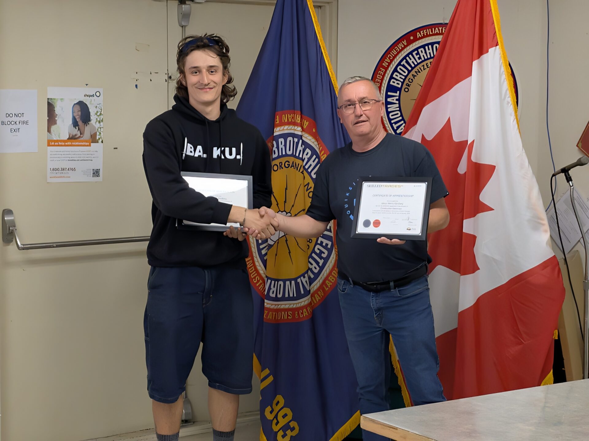 Jaksun Sandberg receiving his Red Seal from Business Manager, Jim Bicknell